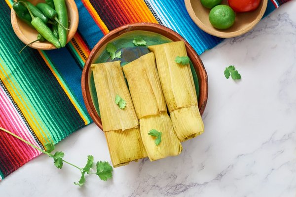 How to Make Authentic Mexican Tamales with a Spicy Mole Sauce?